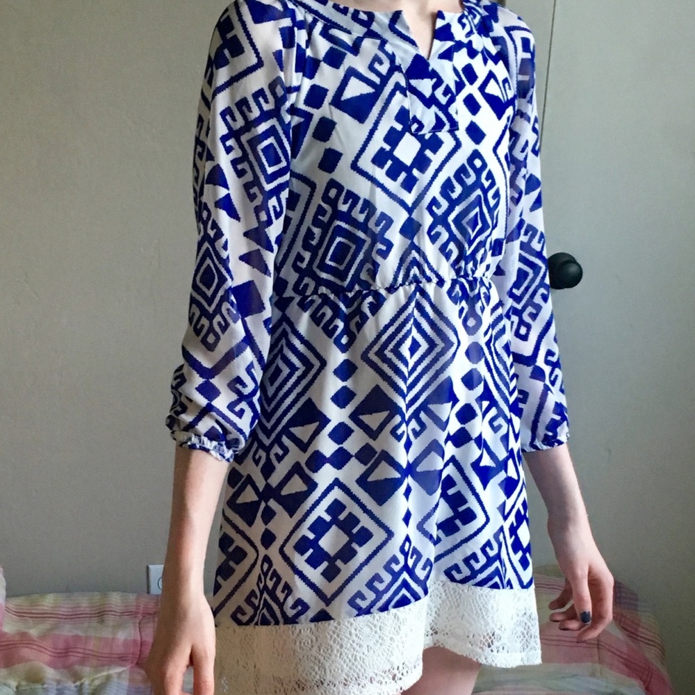 Blue patterned dress with cream crochet trim